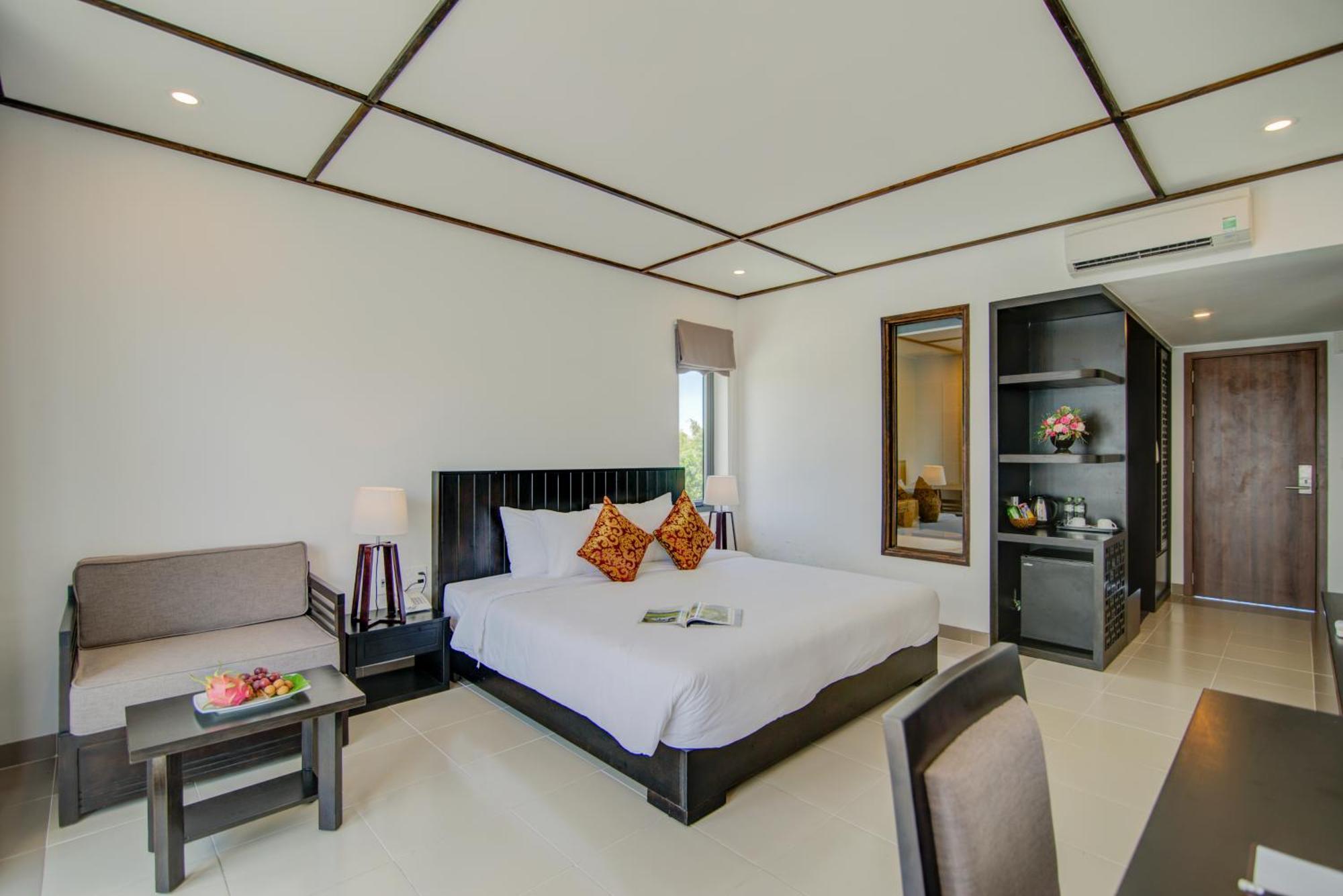 White Lotus Hotel Hoian هوي ان الغرفة الصورة
