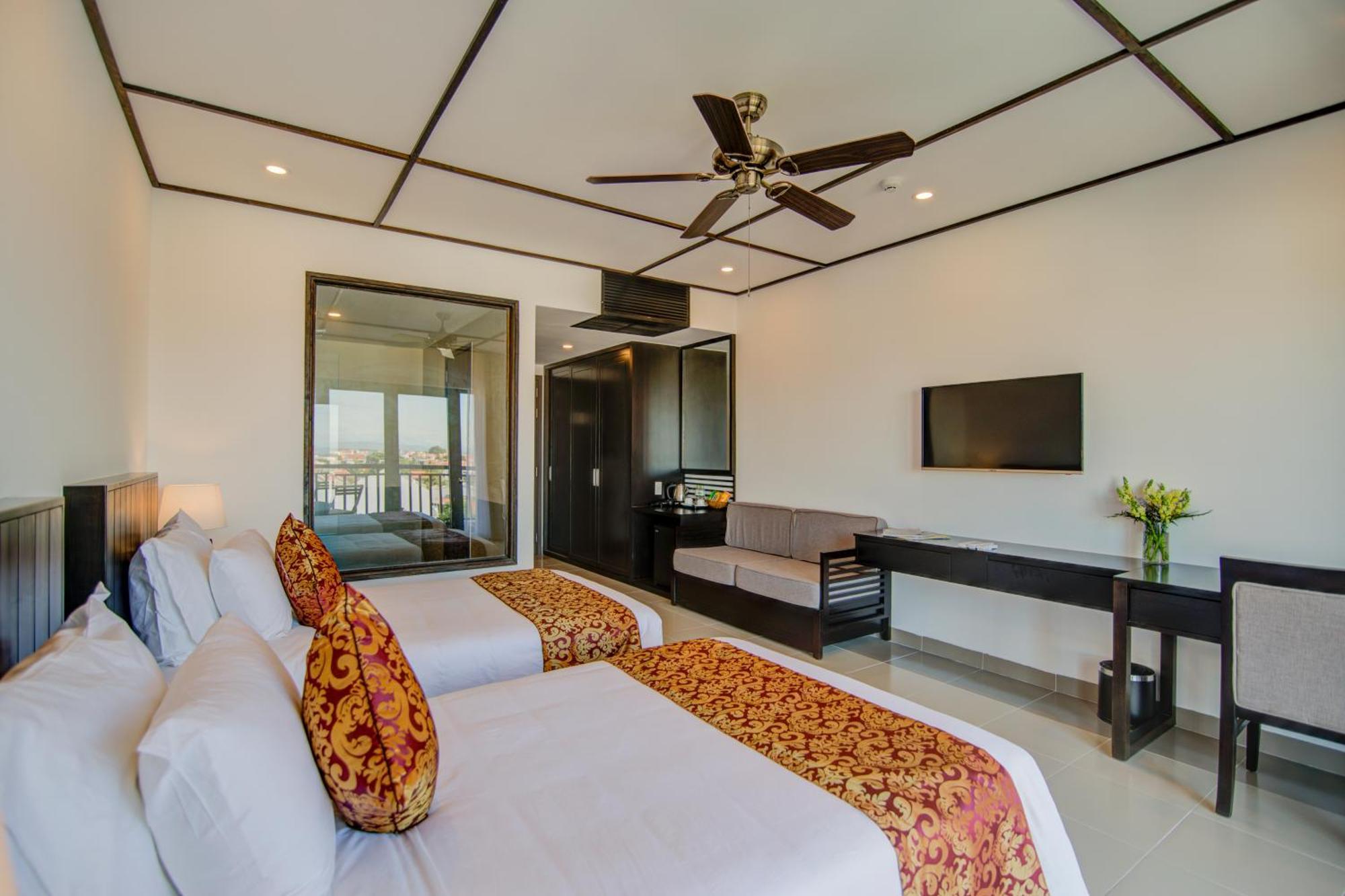 White Lotus Hotel Hoian هوي ان الغرفة الصورة